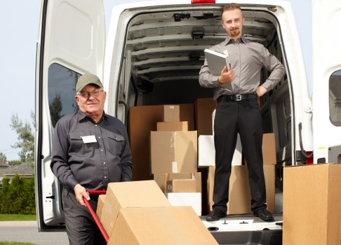 Professional movers packing a home in Kensal Green