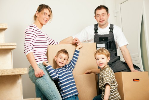 Happy family settling into their new home with House Removals Falconwood