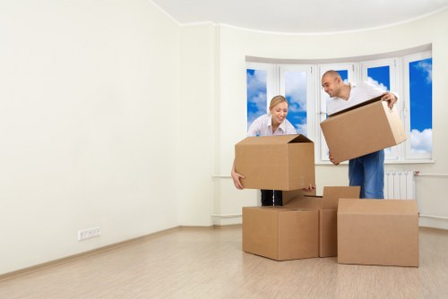 Professional movers packing furniture in Bowes Park