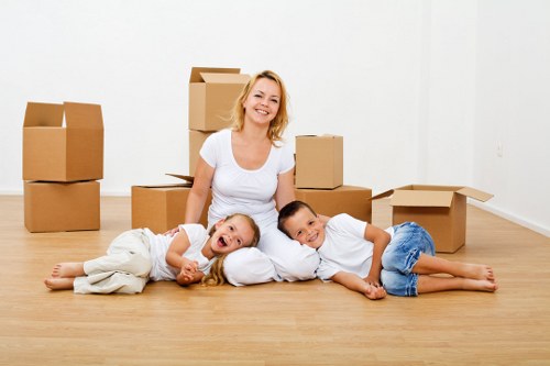 Movers handling furniture during a house removal