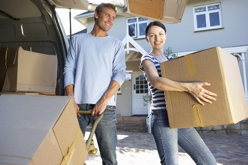 Happy family settling into their new Bloomsbury home after a move