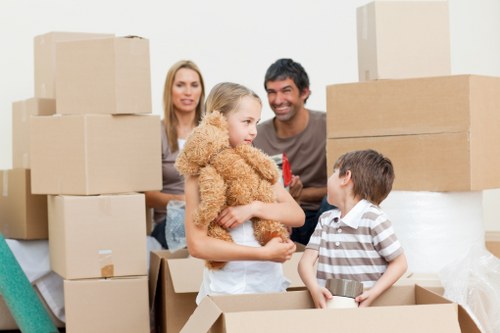 Happy family settling into their new Wood Green home